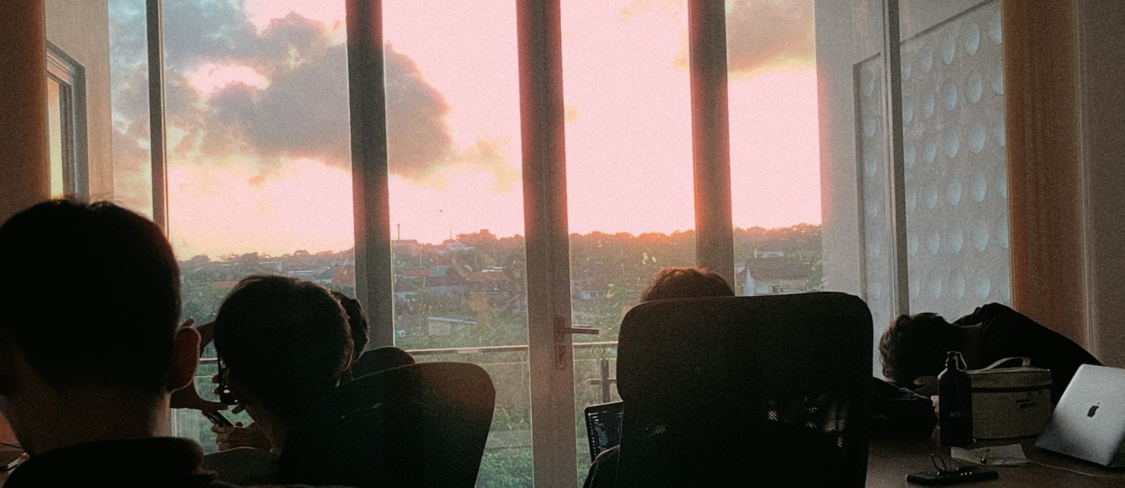 A team working together at sunset