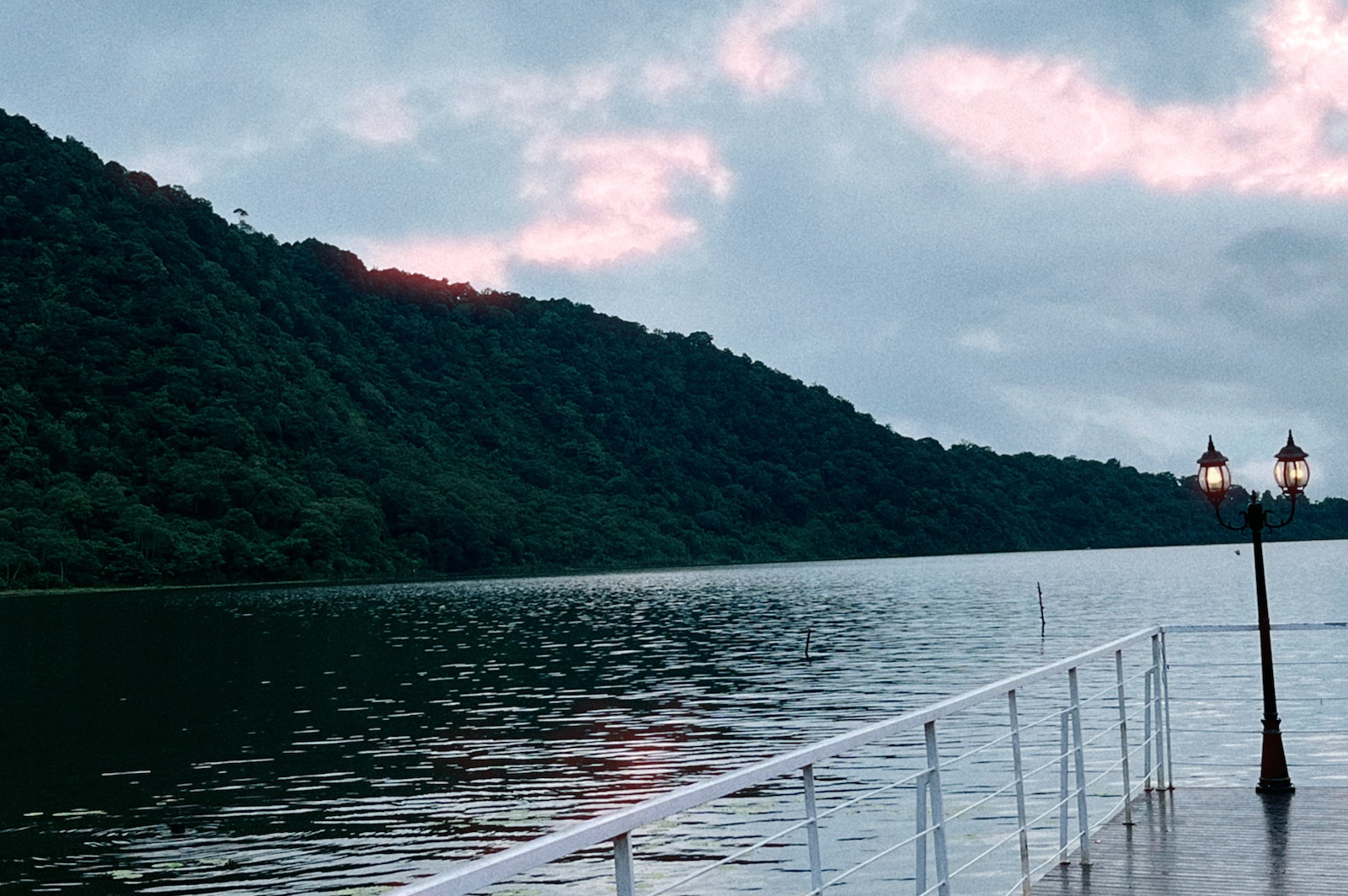 A lakeside landscape at dusk